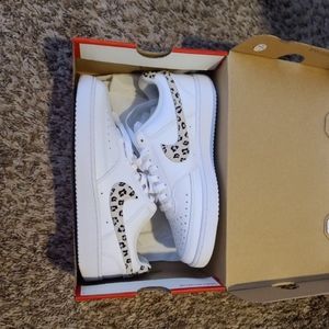 White and leopard print nikes